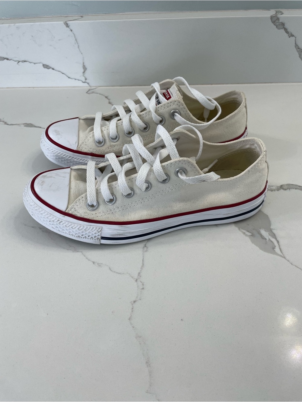 Converse Low-Top Canvas Sneakers in White with Red Trim